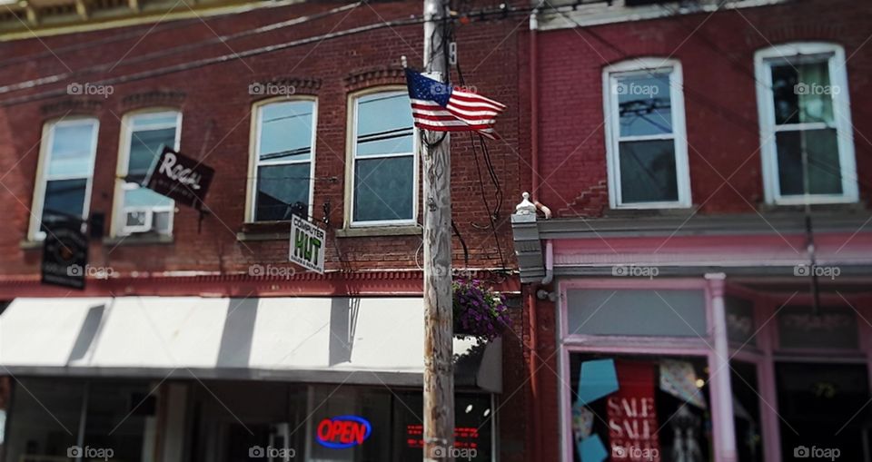 Row of old buildings with flag