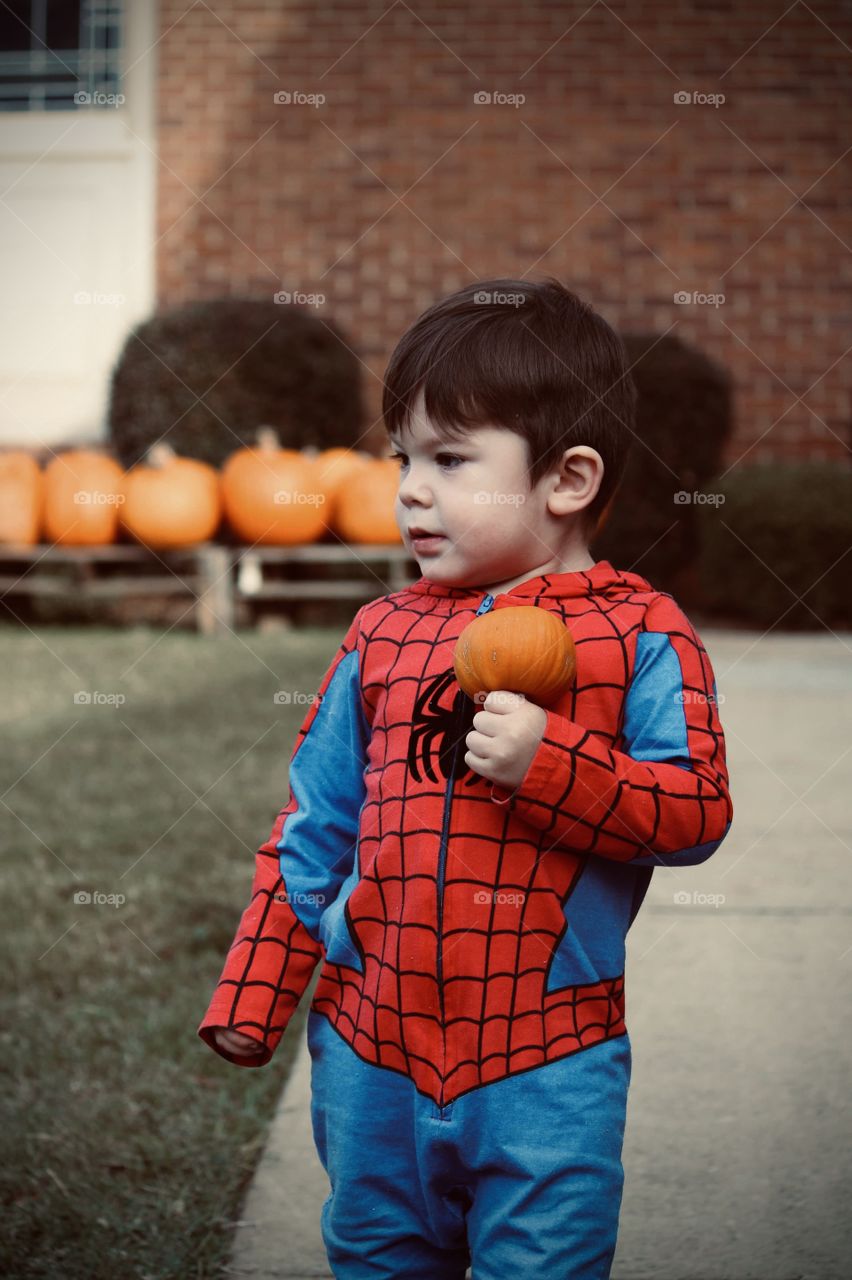 He finally picked out a pumpkin 