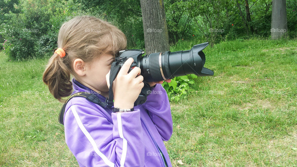 little girl take a picture