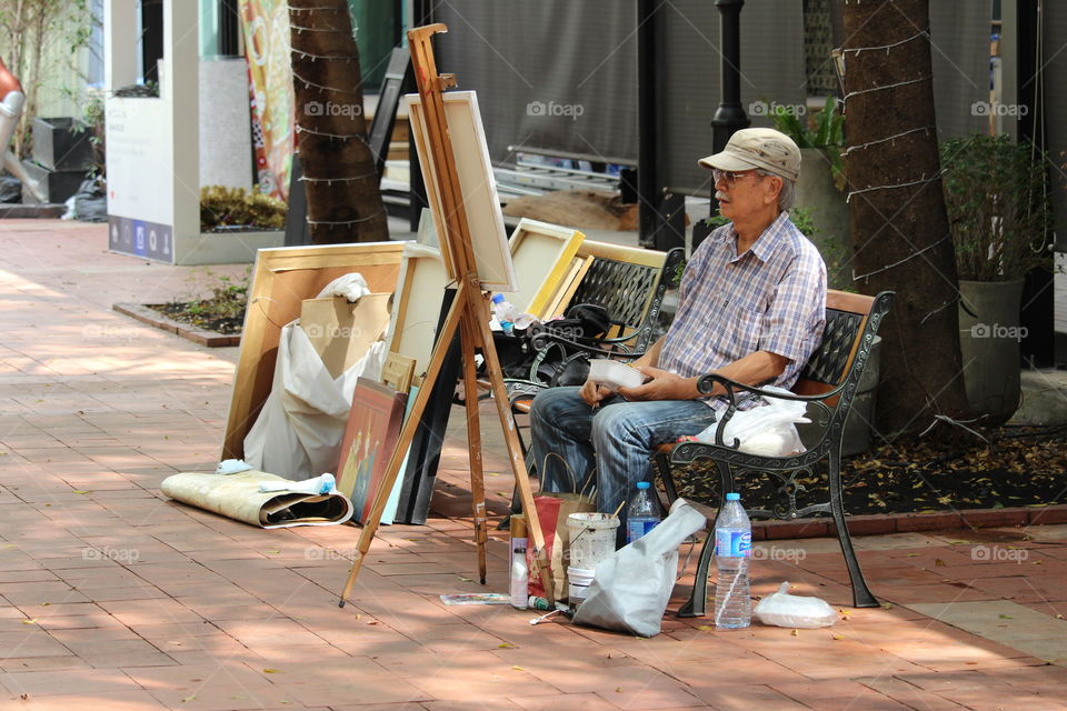 Painter at work Bangkok Thailand