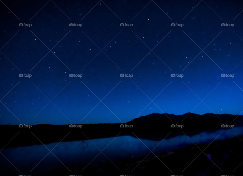 Stars fill the night sky just outside the Grand Canyon