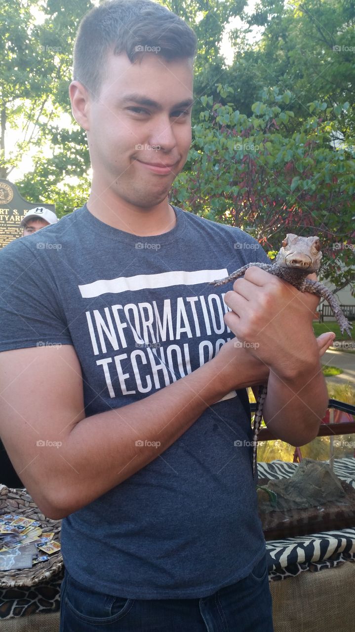 Man boy funny animal alligator lizard college Event Nature