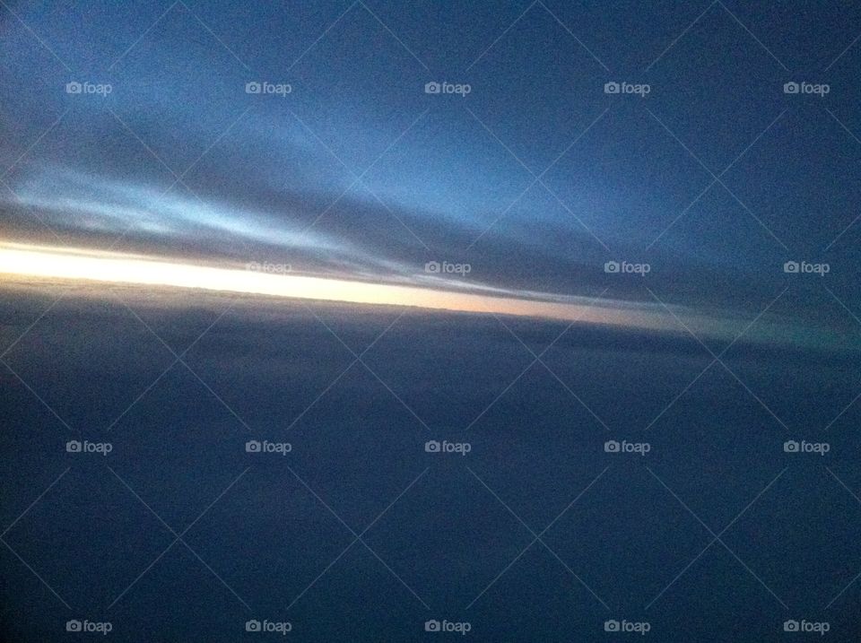 Aerial view of Sunlight through the cloud layers