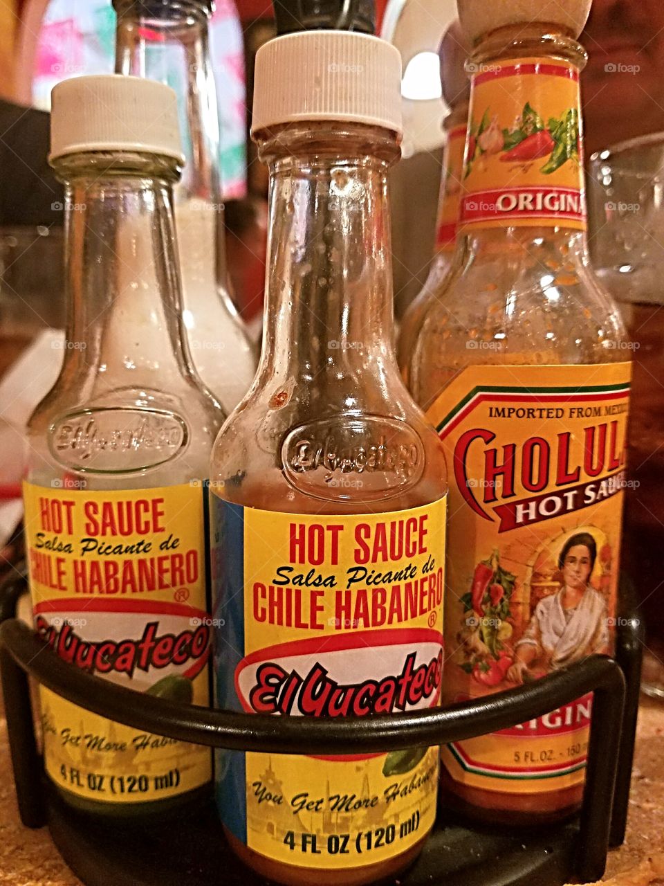 Hot sauce condiments at Mexican restaurant