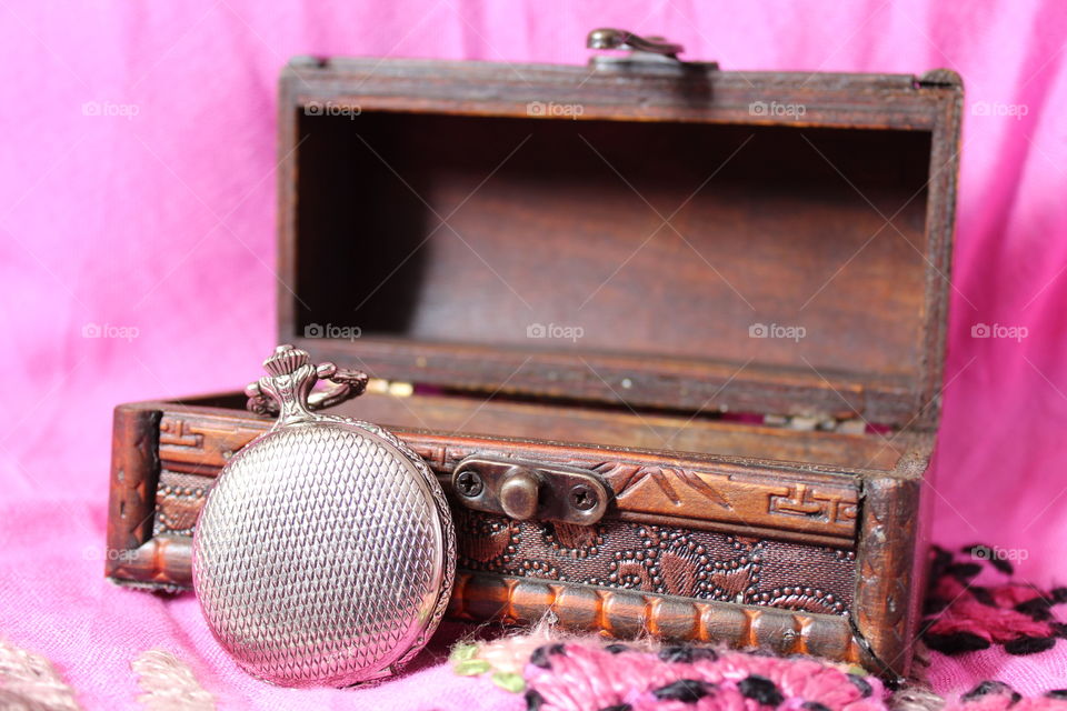 pocket watch and treasure chest