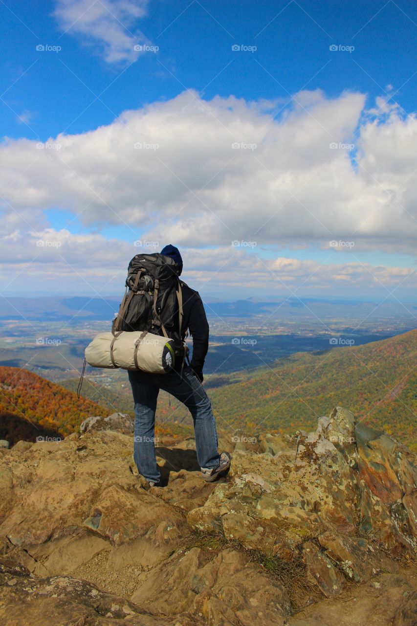 Backpacker hiking the Appalachian Trail in Autumn.