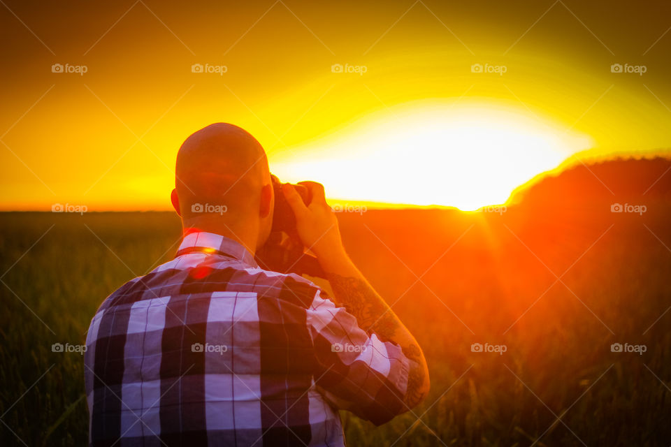 Photographer. Shooting a landscape