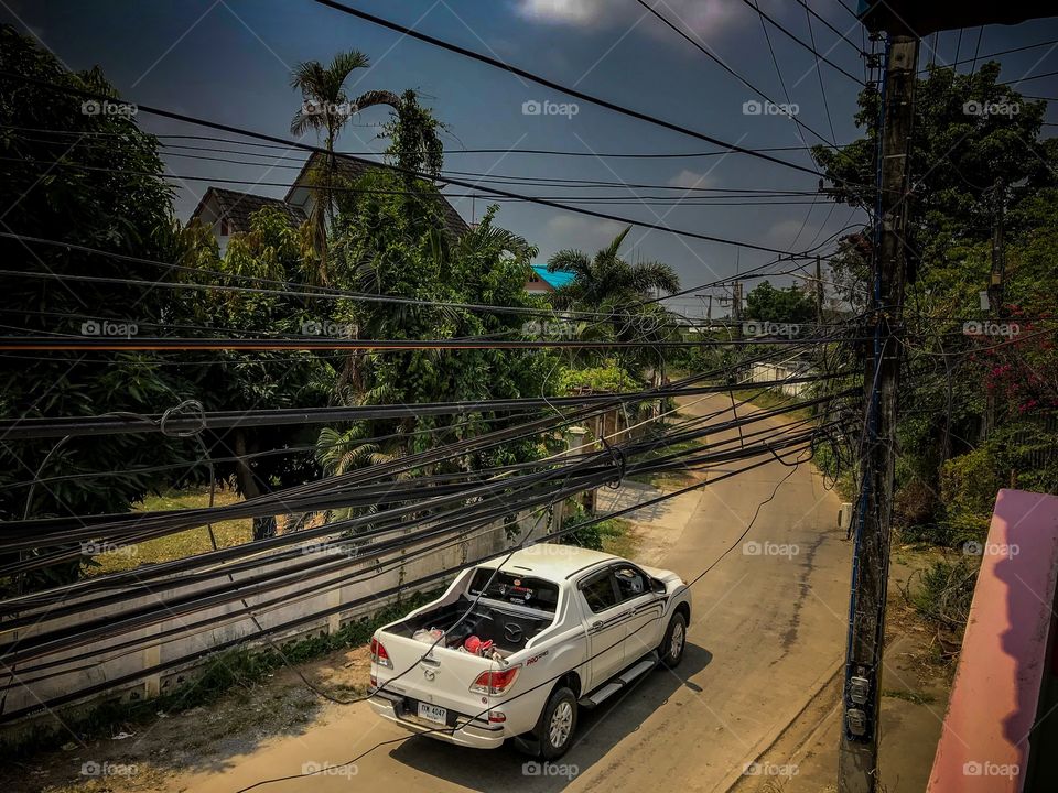 Car on road, Phitsanulok, Thailand 