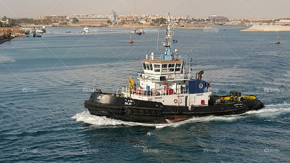 Tag boat in Suez Canal