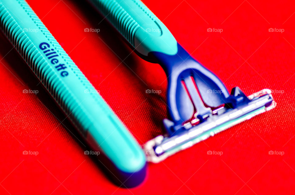 Gillette shaving blades in red background