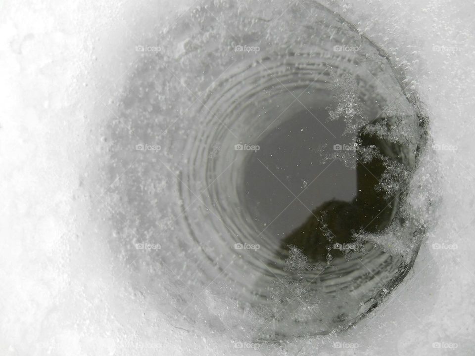 winter ice hole fishing