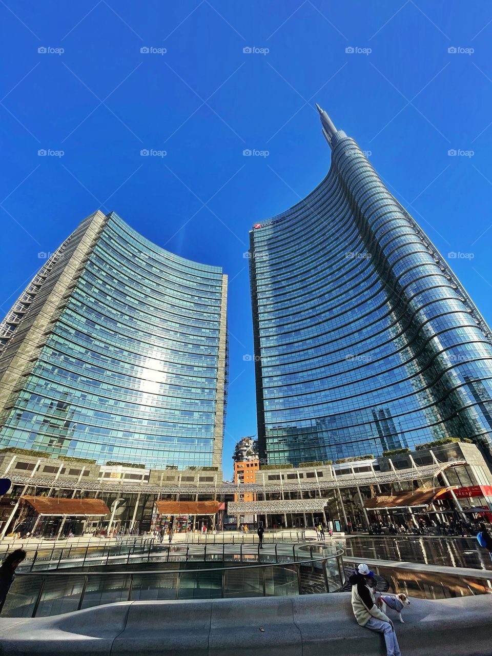 Skyscrapers of Milano under a blue perfect sky in a sunny morning. Gae Aulenti square