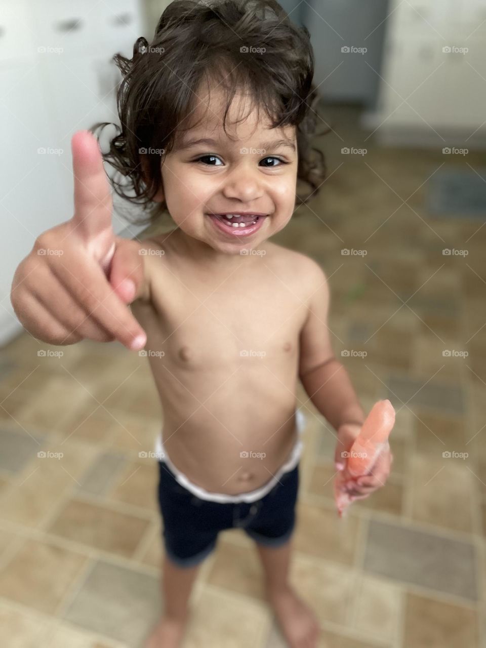 Toddler with a popsicle, summertime treat, kids and popsicles