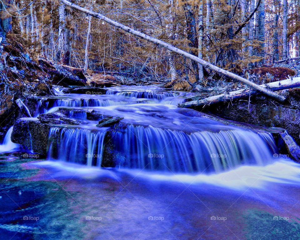 Blue waterfall at forest