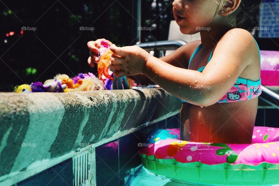 playing in the pool