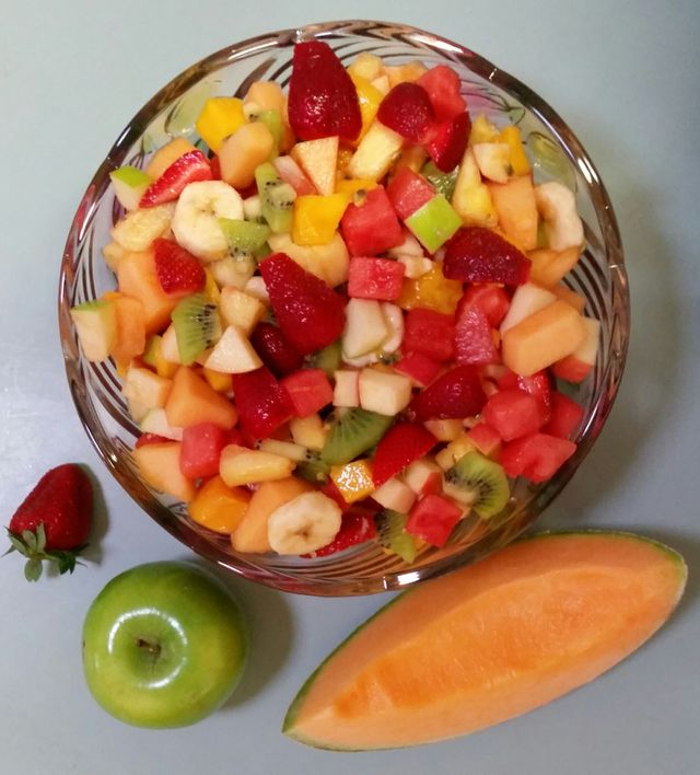 Fruity fruity dessert. Delicious freshly cut pieces of fruit in a bowl ready for dessert.