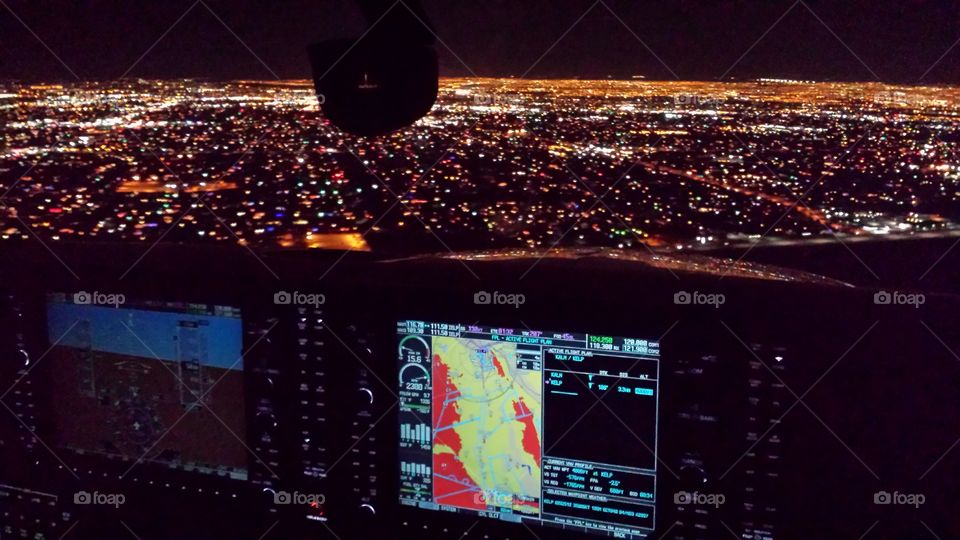 Airplane Flight Deck. Flight deck of Cessna 206 Turbo with G1000 landing at El Paso, Texas at night