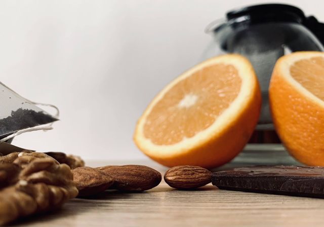 Photos product orange, tea and some dried fruits 