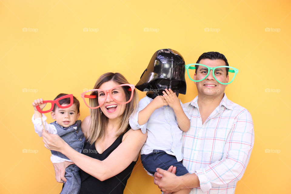 Portrait of a family with funny eyewear