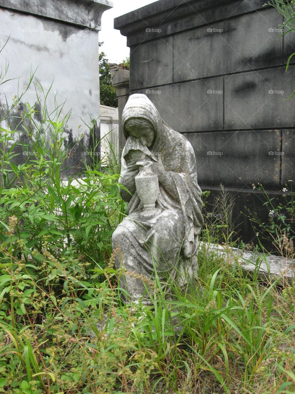 Weeping woman at Lafayette Cemetery #1, New Orleans 