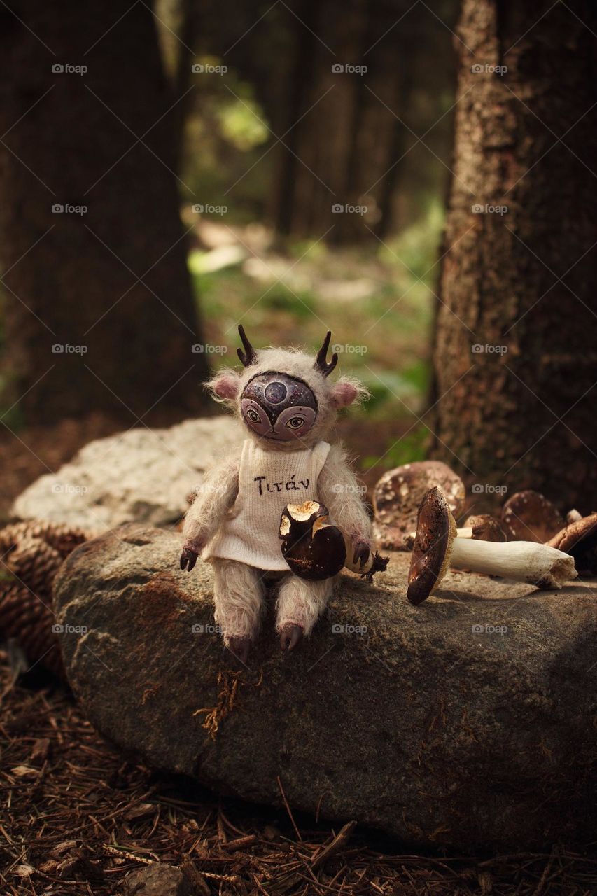 Toy deer and mushrooms 