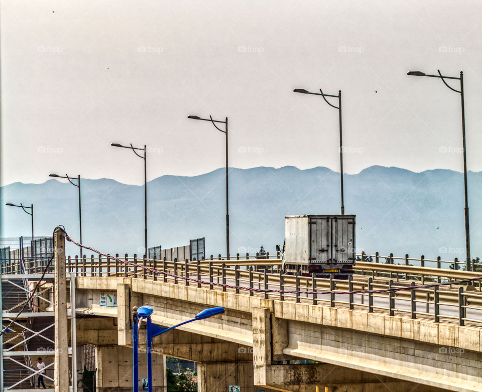 Bridge throw clouds and sky,  with a special view of clouds as mou6
