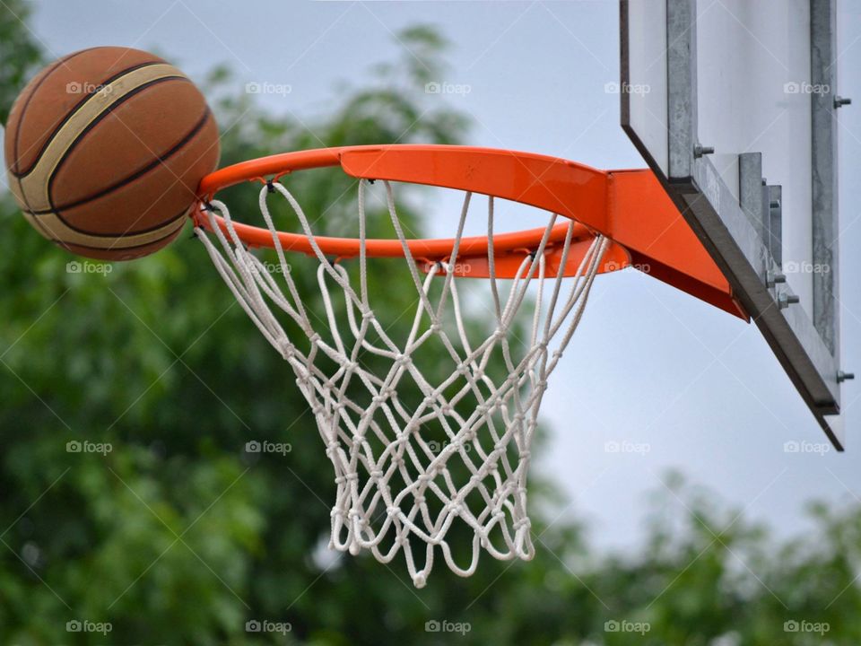 Basketball and basketball hoop