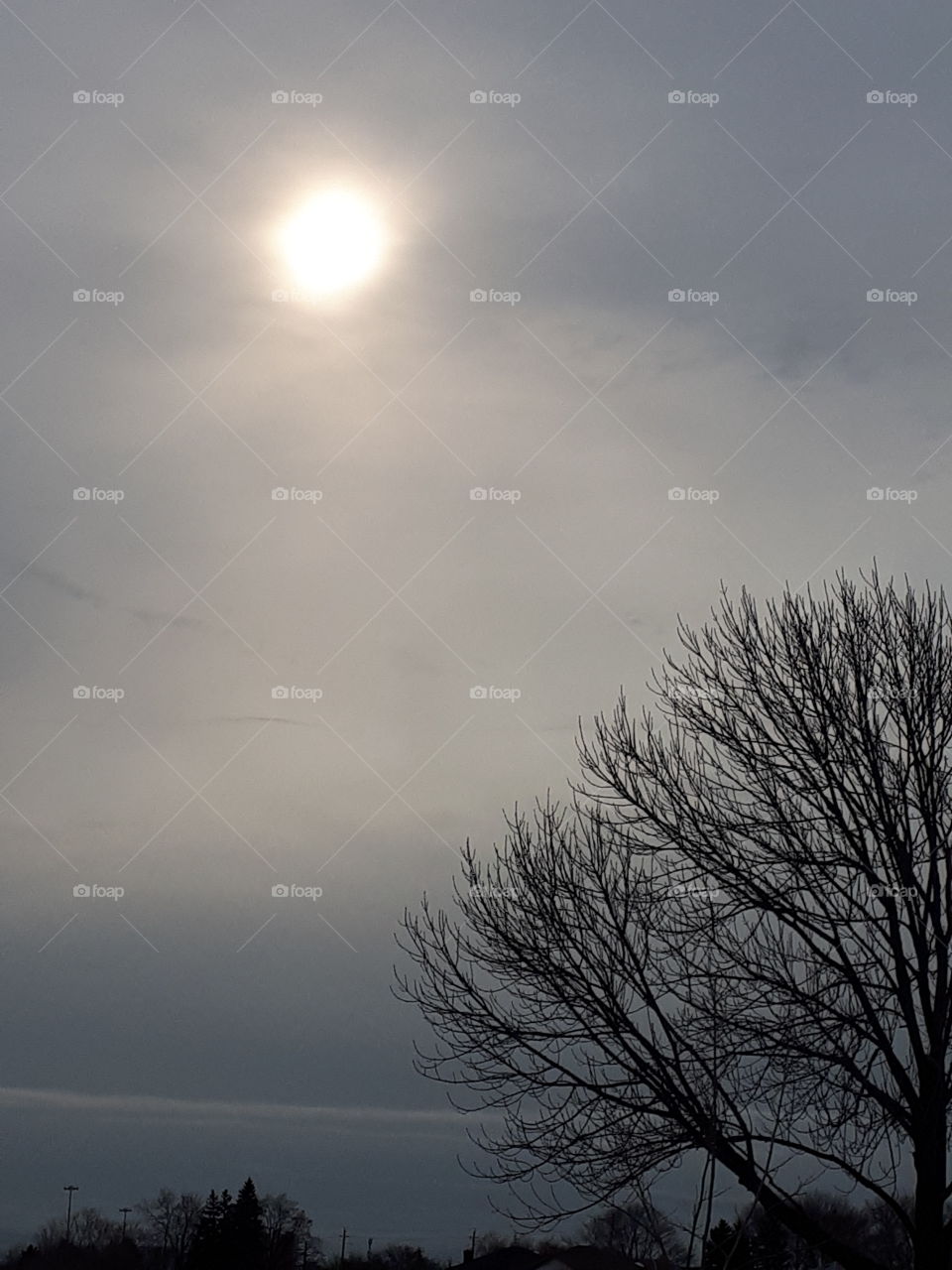 sun peering  through the clouds