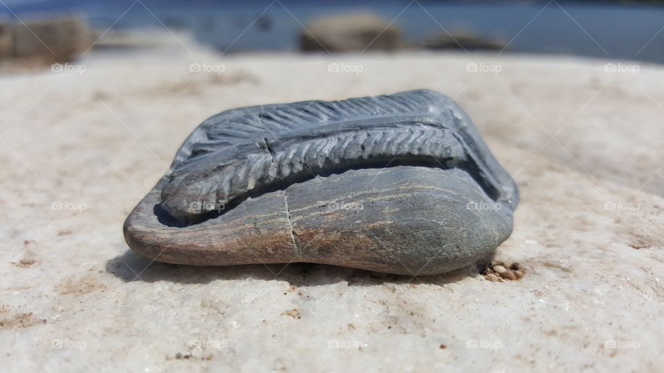 Feather.  Once was just a pebble