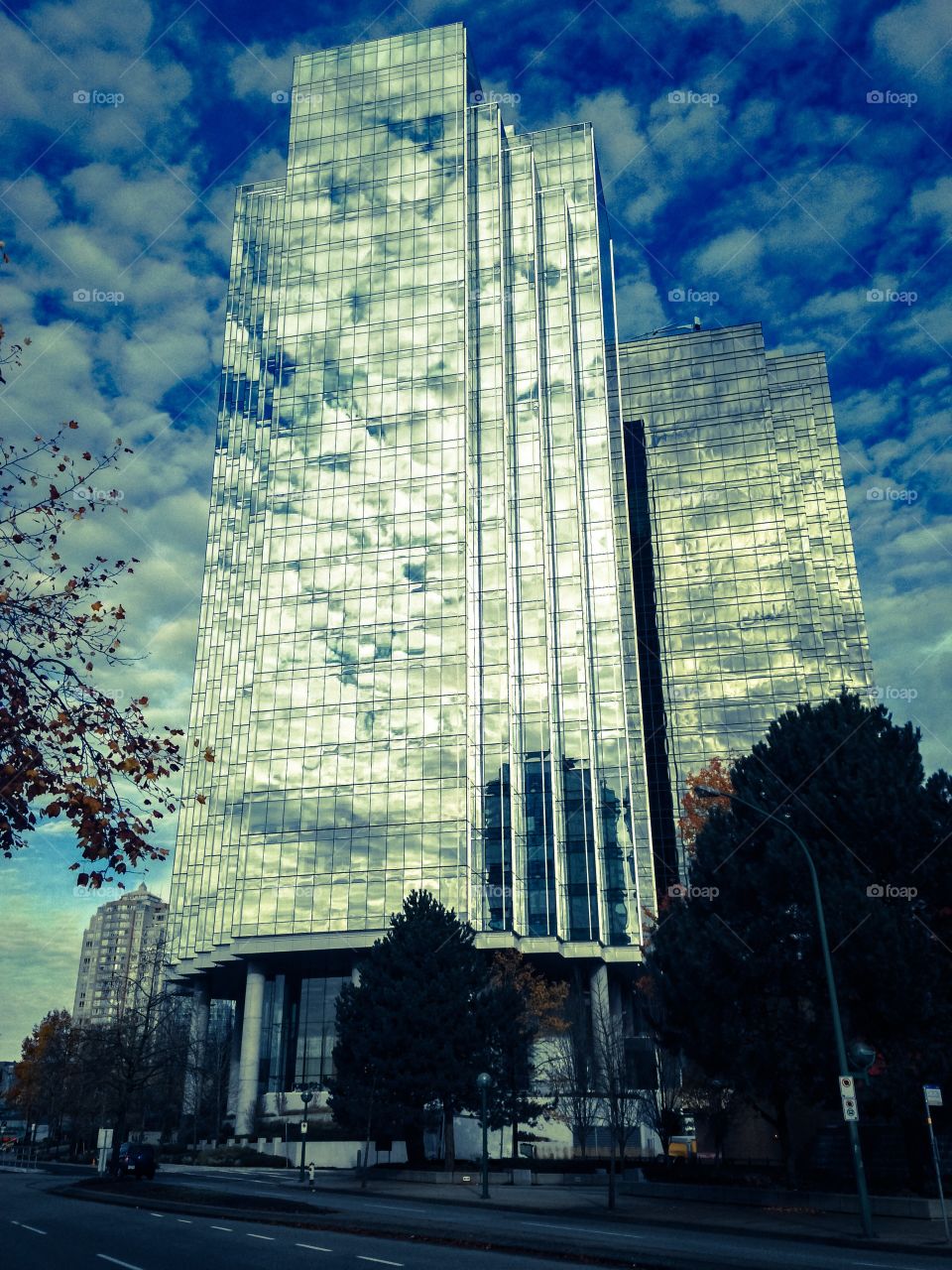Glass building cloud reflection 