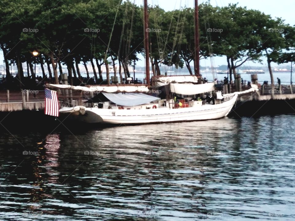 yacht with American flag at Liberty State park