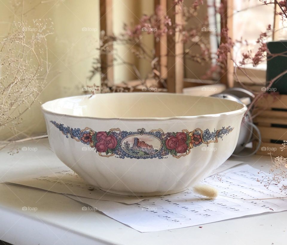 Vintage deep bowl with pastoral ornaments 