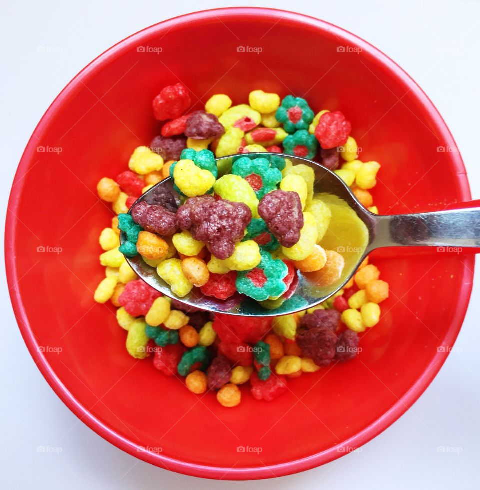 Sweet candies in red bowl