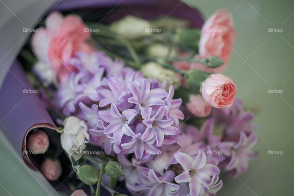 Spring bouquet in pink and purple colors 