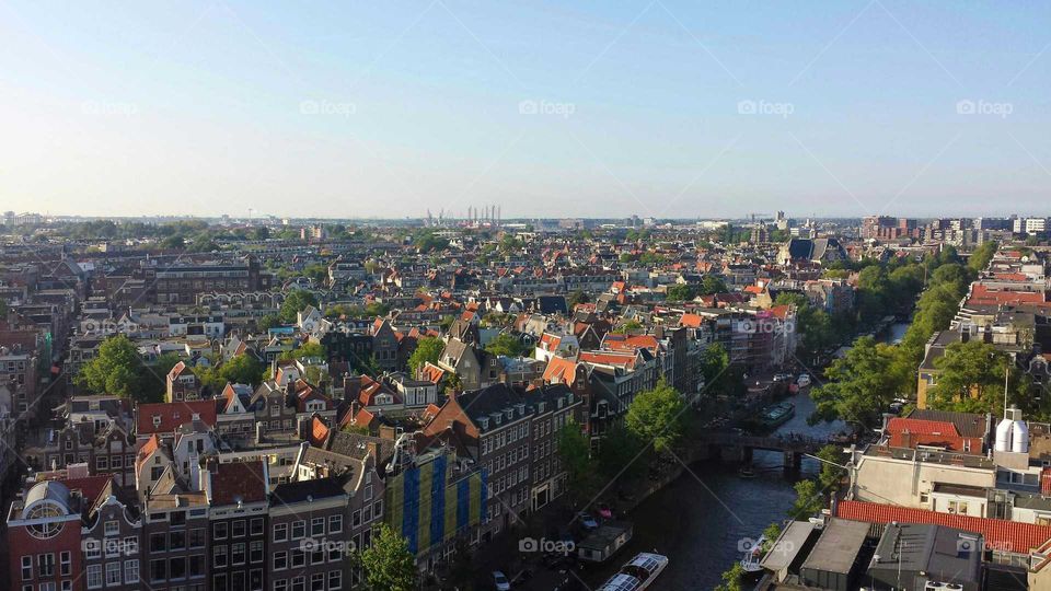 At glimpse of Amsterdam from  the bell tower of a church.