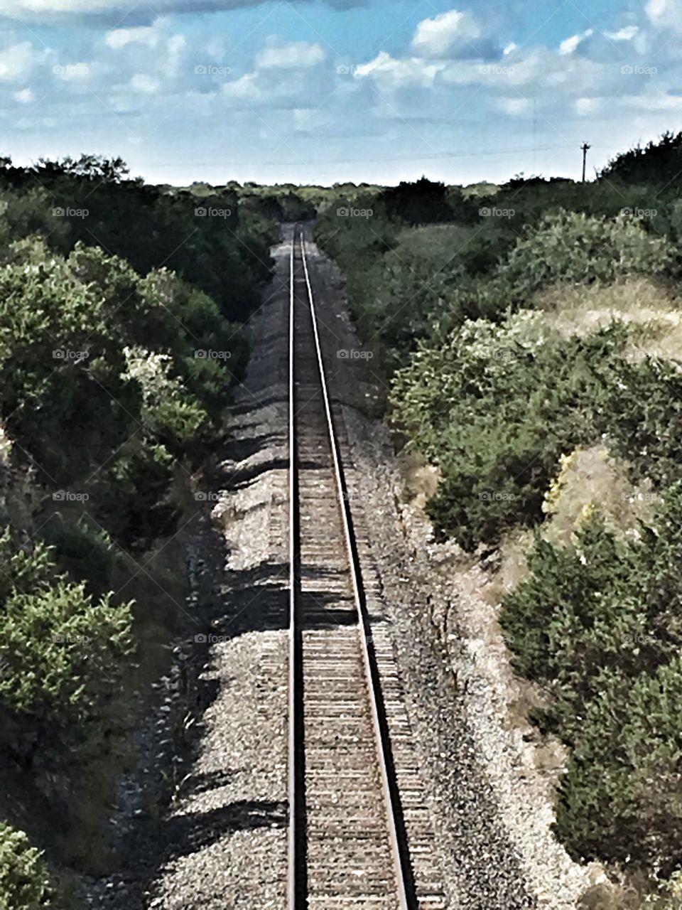 Bridge over train tracks in Blum, Texas. 