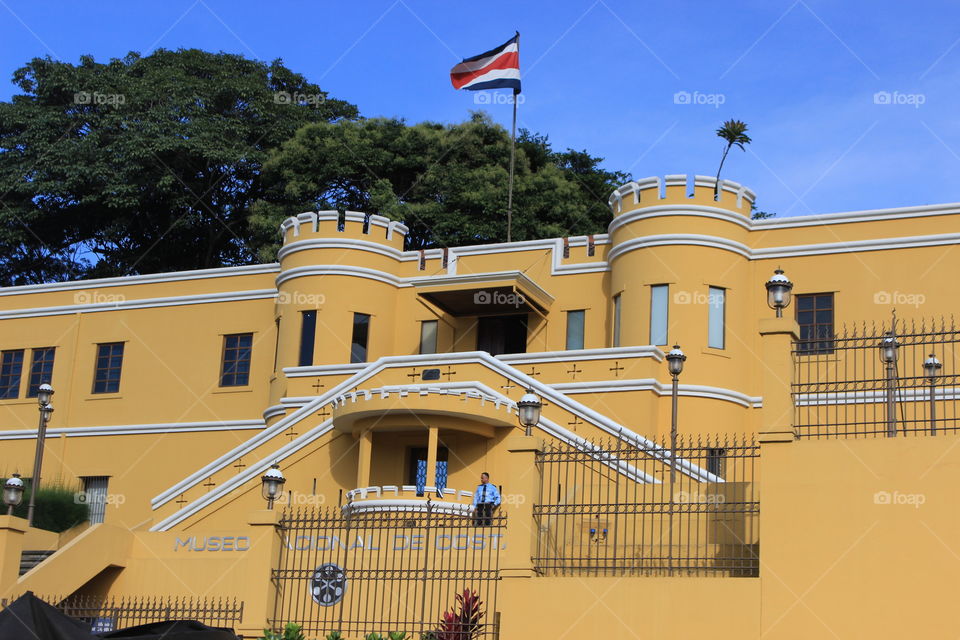 A yellow building or mansion that once house army and prisoners is now a museum