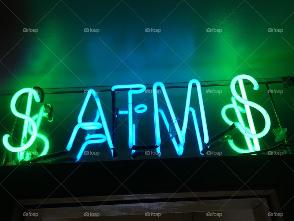 ATM $ neon sign
