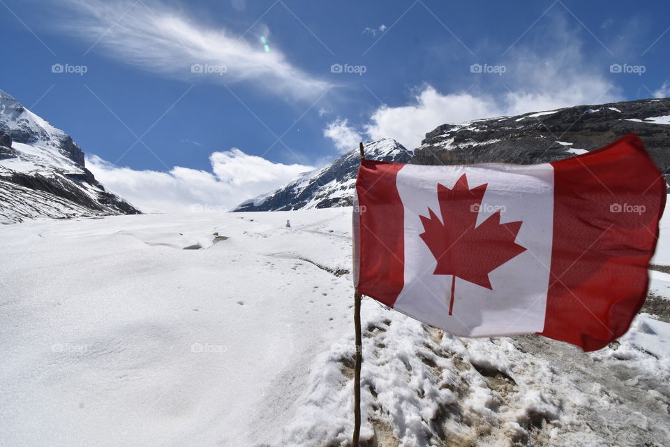 The best kind of shape, a Canadian rectangle! The stunning flag with the pristine Athabasca Glacier gleaming behind it. 