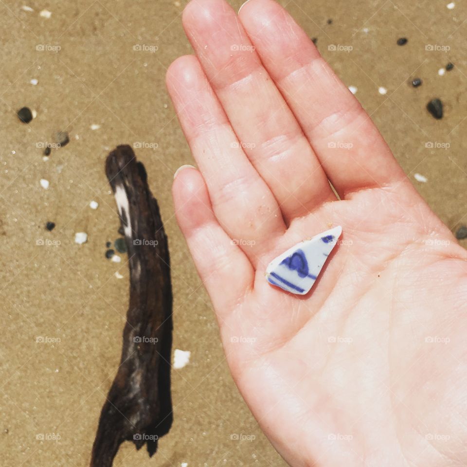 Ming porcelain shard on the beach 