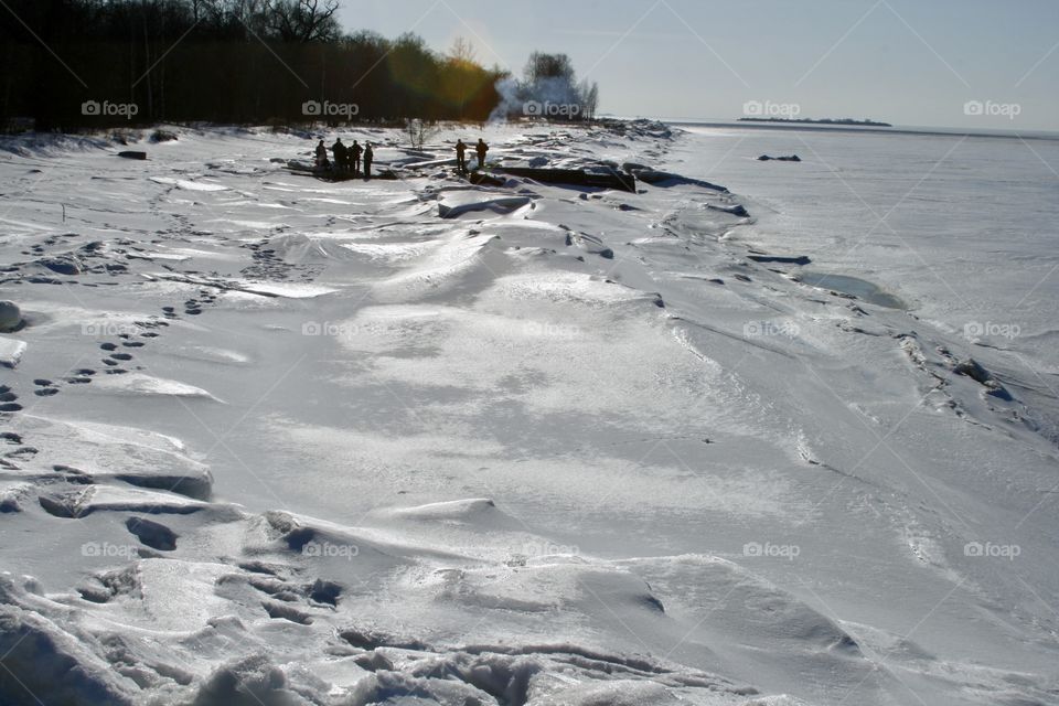 People at beach in winter