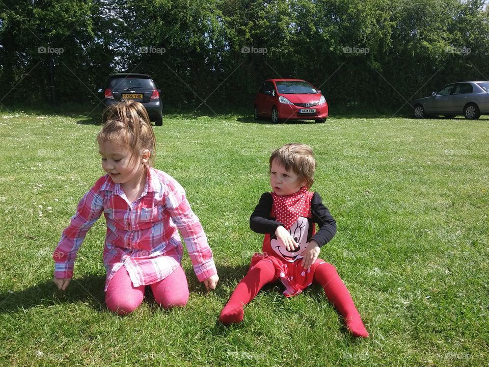 Two sister playing in park