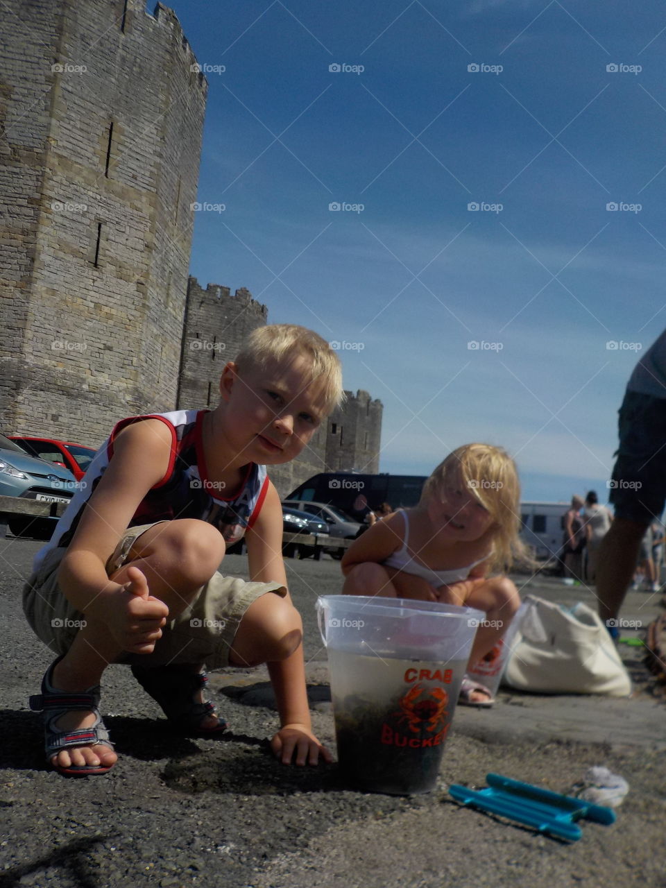 Portrait of a two children playing on street