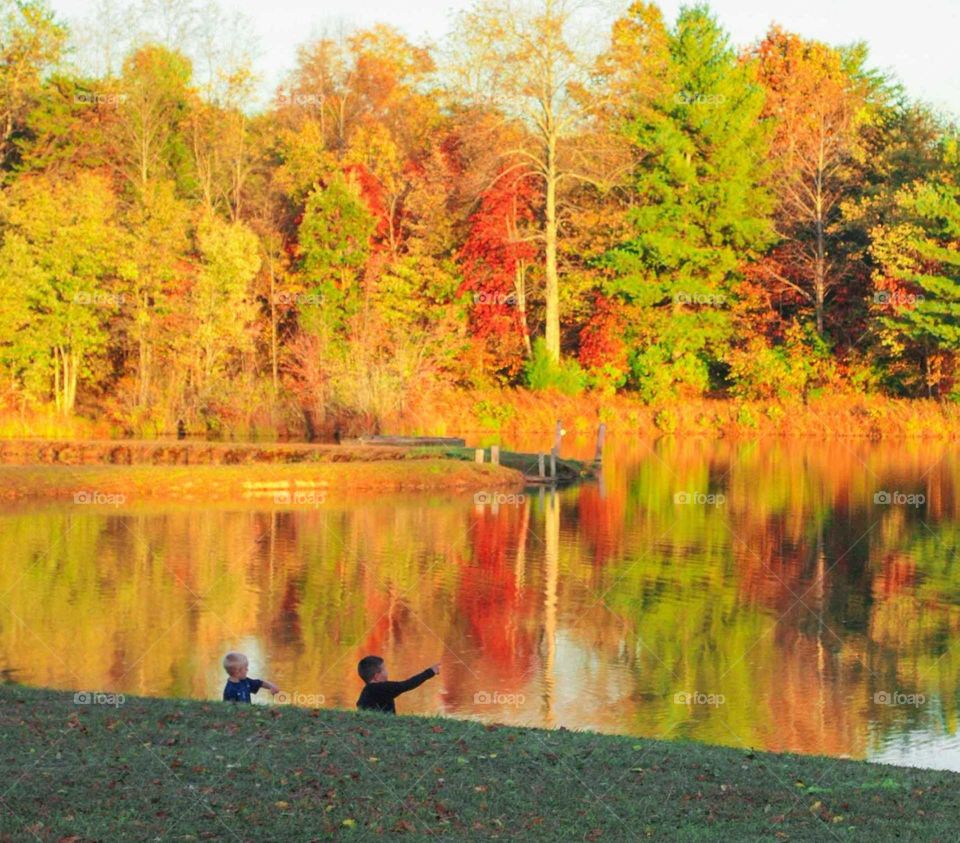 fall lake with children