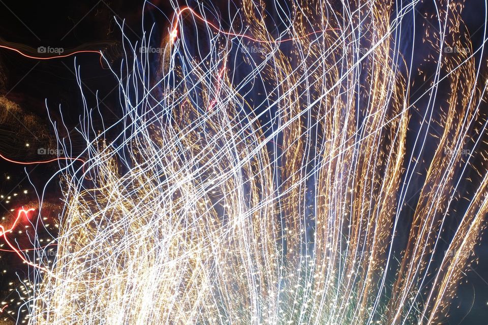 Streaks of fireworks flashing across the night sky at the finale of the Perth royal show