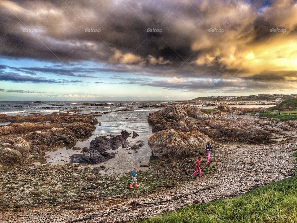 Exploring tides. My kids coming in after a day of exploring tidal pools. Amazing light at dusk
