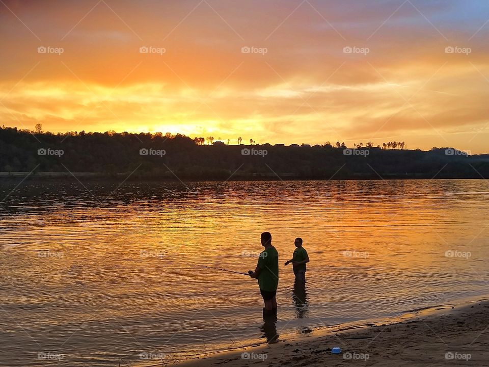 Fishing at sunset.