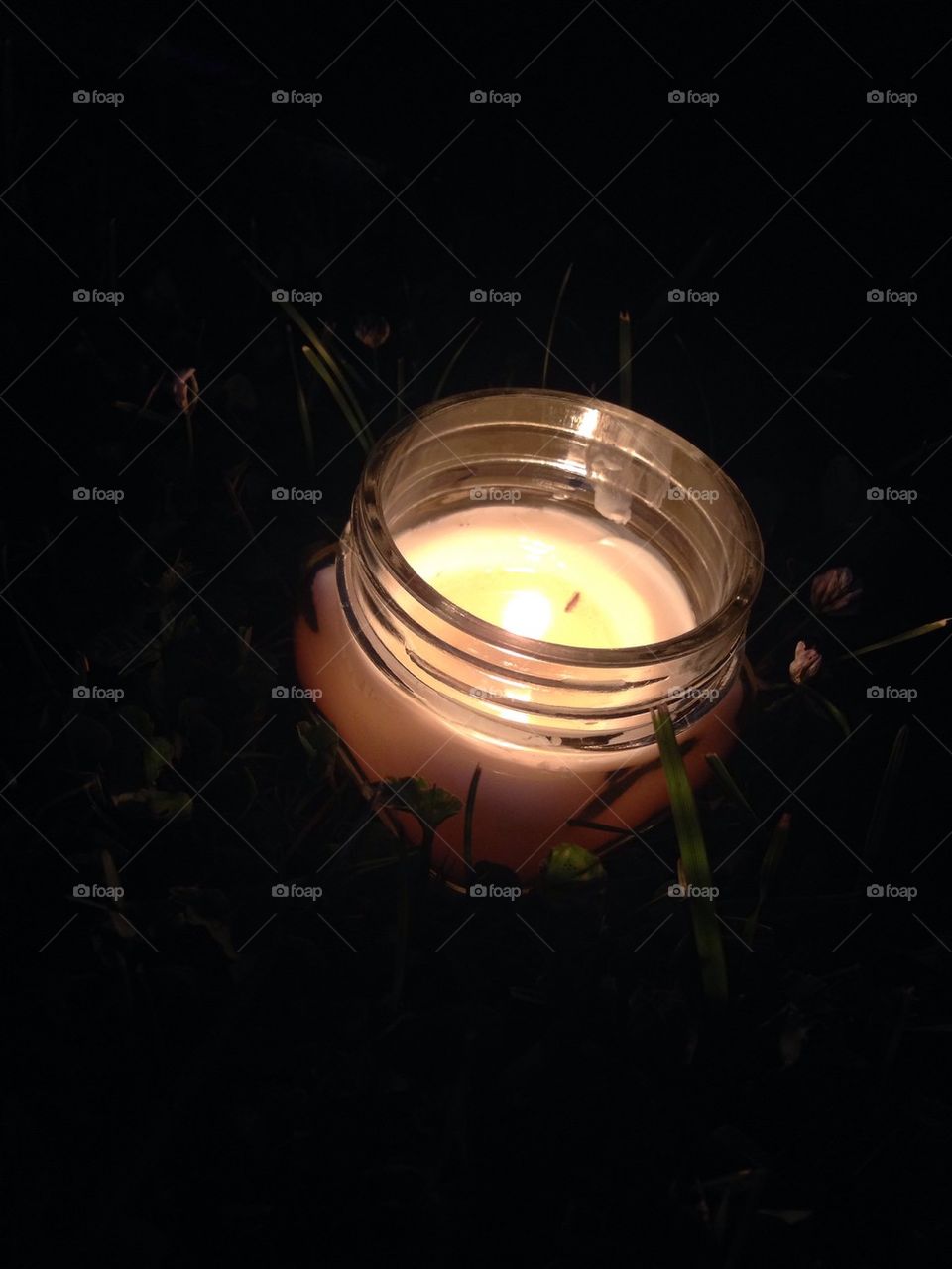 Candle in the Grass