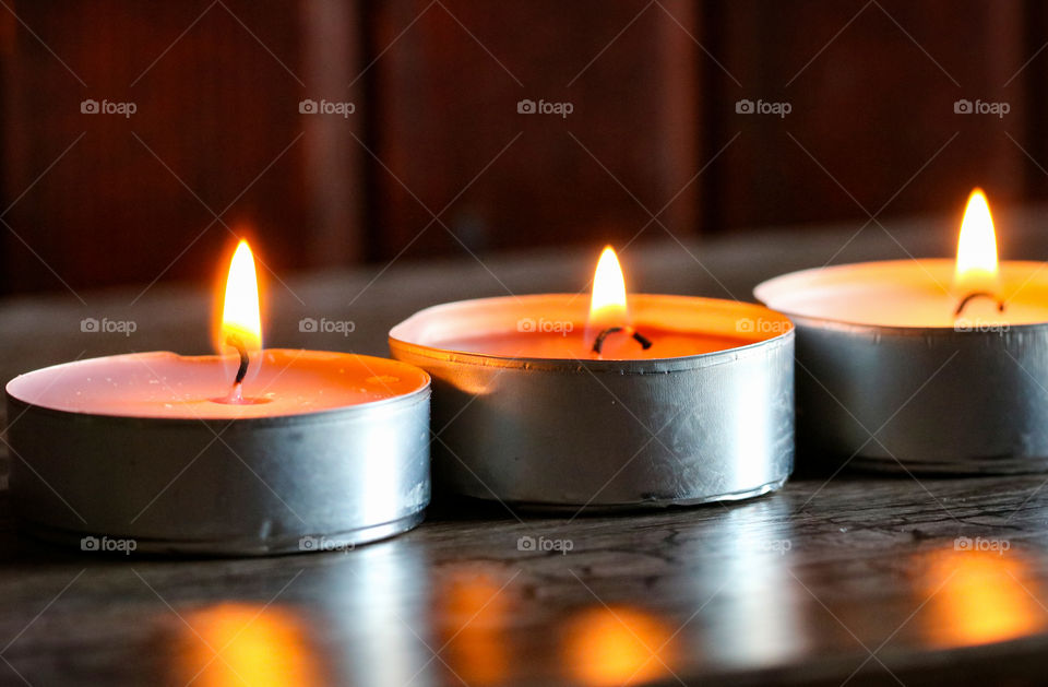 Three candle lights at home