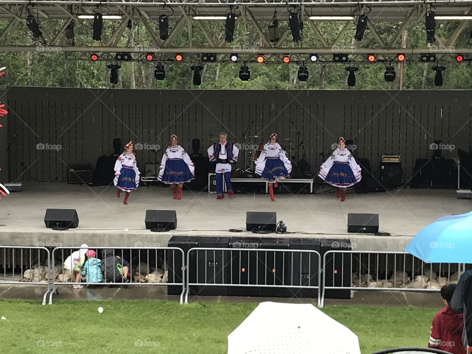 Dancers in blue and white perform at Bower Ponds for Canada Day.